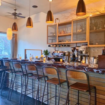 Coquine - Inside, gorgeous bar table! - New American Near Me - Portland, Oregon
