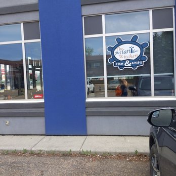 The Atlantic Kitchen - a car parked in front of the restaurant - Fish & Chips Near Me - St. Albert, Alberta The Atlantic Kitchen - a car parked in front of the restaurant - Fish & Chips Near Me - St. Albert, Alberta