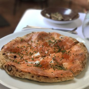 Spago - Salmon pizza - put Wolfgang on the map and for good reason - New American Near Me - Beverly Hills, California