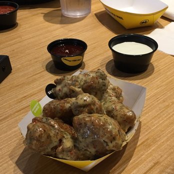 Buffalo Wild Wings - Garlic Parmesan boneless wings with a side of the incredibly hot Scorpion Rum sauce - Chicken Wings Near Me - York, Pennsylvania