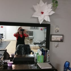 Elena's salon - These are the new poinsettia decorations  Shiraya made for the salon.   Her name is Shiraya McCain.