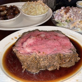 The Peddler Steakhouse - Prime Rib of Beef Au Jus, sautéed mushrooms and onions and a salad made a la cart - Steakhouses Near Me - Hamer, South Carolina The Peddler Steakhouse - Prime Rib of Beef Au Jus, sautéed mushrooms and onions and a salad made a la cart - Steakhouses Near Me - Hamer, South Carolina