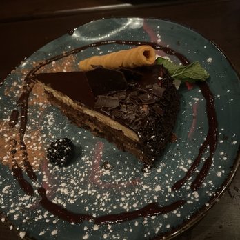 Divan Restaurant - Hazelnut chocolate cake - Persian/Iranian Near Me - Mclean, Virginia Divan Restaurant - Hazelnut chocolate cake - Persian/Iranian Near Me - Mclean, Virginia