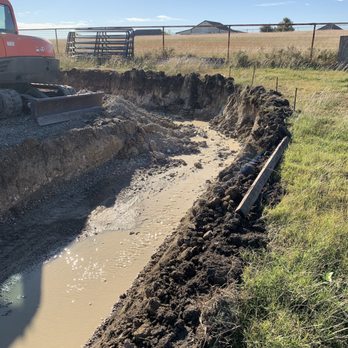 Command Grade Services - a bulldozer digging a trench - Excavation Services Near Me