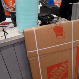 Hangar boxes, more boxes, more wrap. Getting ready to move along lil' doggy Hangar boxes, more boxes, more wrap. Getting ready to move along lil' doggy