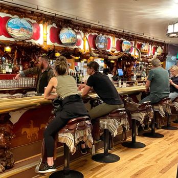 Million Dollar Cowboy Steakhouse - Fun seating at this one of a kind bar and restaurant - Steakhouses Near Me - Jackson, Wyoming