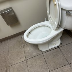 Carefirst Urgent Care - Dirty toilet and floor in restroom