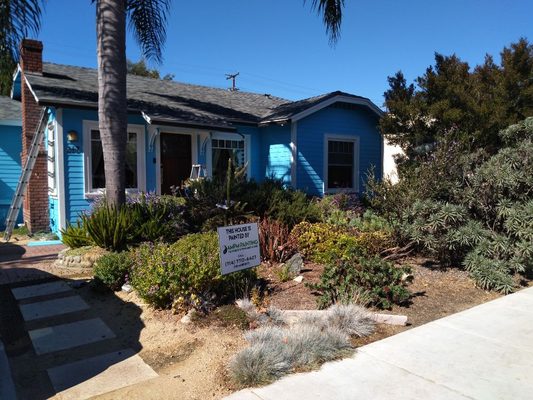 Repainting a 100 year old home - We fully repainted this 100 year old house and detached garage. Before repainting, we spent ten days scraping, priming, patching, and sanding the wood surfaces —  according to customer, we saved the building.
