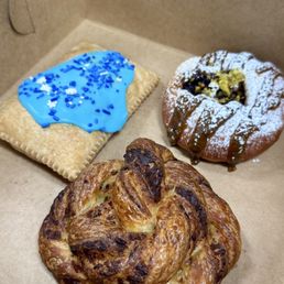 Strawberry/guava pop tart, blueberry pistachio danish, pesto/parm croissant