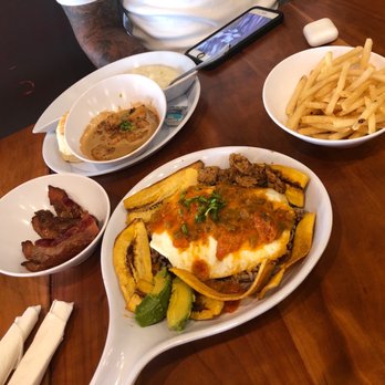 Ruby Slipper Uptown - Costa Rican, bbq shrimps & Grits, Fries, pig candied bacon - Cafes Near Me - New Orleans, Louisiana Ruby Slipper Uptown - Costa Rican, bbq shrimps & Grits, Fries, pig candied bacon - Cafes Near Me - New Orleans, Louisiana