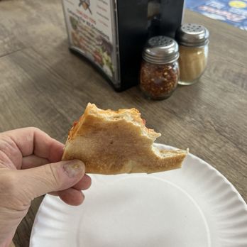 Bronx Pizza - See the bottom of the crust . Perfectly Baked - Pizza Near Me - Deerfield Beach, Florida