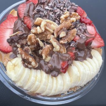 Playa Bowls - Custom: Mango & Pitaya base with strawberries, bananas, walnuts, chocolate & peanut butter sauce - Juice Bars & Smoothies Near Me - Milton, Massachusetts Playa Bowls - Custom: Mango & Pitaya base with strawberries, bananas, walnuts, chocolate & peanut butter sauce - Juice Bars & Smoothies Near Me - Milton, Massachusetts