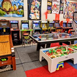 Play Favorites - Discover the Play Favorites arcade room with retro video games, a roll-and-score lane, air hockey and BRIO train tables...