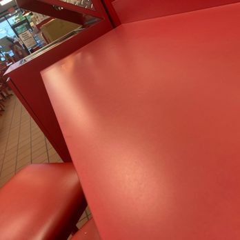 Firehouse Subs - a red table and chairs - Fast Food Near Me - Bossier City, Louisiana Firehouse Subs - a red table and chairs - Fast Food Near Me - Bossier City, Louisiana