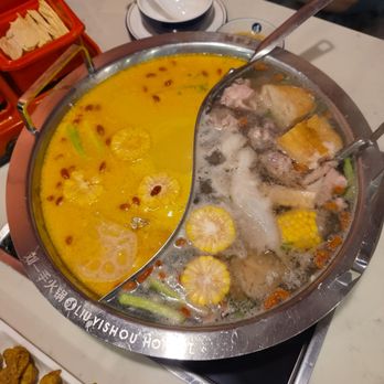 Liuyishou Hotpot - Golden soup on the left. Coconut soup on the right. - Chinese Near Me - Boston, Massachusetts