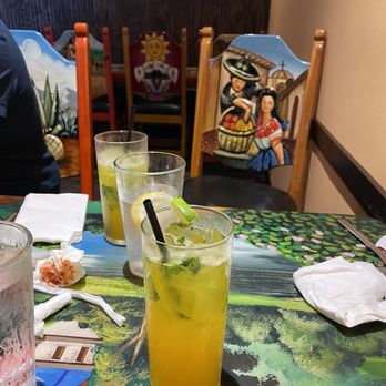 Mr. Tequila Authentic Mexican Restaurant - Example of artistic decor, in foreground delicious mango mojito. - Mexican Near Me - Sarasota, Florida Mr. Tequila Authentic Mexican Restaurant - Example of artistic decor, in foreground delicious mango mojito. - Mexican Near Me - Sarasota, Florida