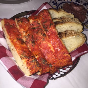 Carbone - Bread basket. The best garlic toast is hidden under that focaccia! - Italian Near Me - New York, New York