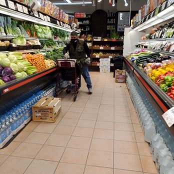Broadway Farm - a grocery store aisle with produce - Grocery Near Me - New York, New York Broadway Farm - a grocery store aisle with produce - Grocery Near Me - New York, New York