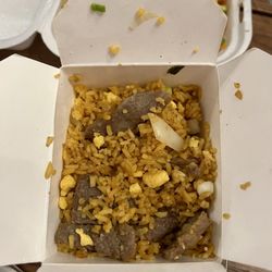 Beef fried rice. A tad salty. Eggs a little overcooked, rice a touch hard. Generous with the meat though.