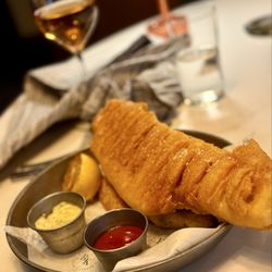 Ramsay's Kitchen - WINNER! This fish is HUGE and so good! The "chips" are actually potato wedges. The only item on the menu that comes with a side.