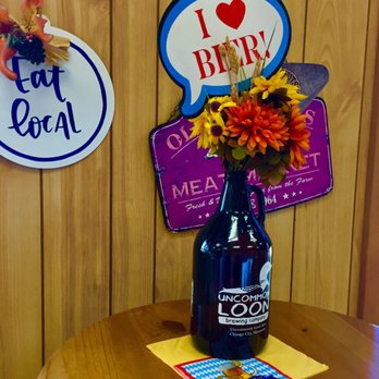 Deutschland Meats - a bottle of beer on a table - Meat Shops Near Me - Lindstrom, Minnesota