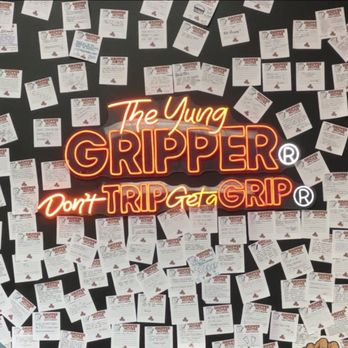 The Gripper Kitchen - a neon sign that says the gripper don't trip - Fast Food Near Me - Pearland, Texas