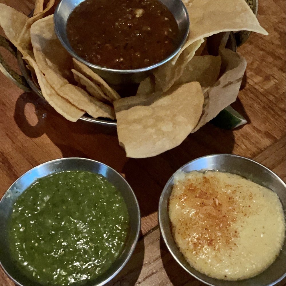 Barrio - Charred Tomato & Jalapeno, Avocado Salsa Verde and White Habanero salsas with chips - Mexican Near Me - Chicago, Illinois Barrio - Charred Tomato & Jalapeno, Avocado Salsa Verde and White Habanero salsas with chips - Mexican Near Me - Chicago, Illinois