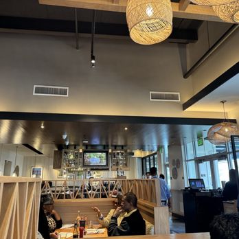 Pacific Catch - Jaime, best server, walking through the beautiful dining area. - Seafood Near Me - Dublin, California