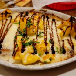 Piccola Italia Restaurant - I forget the name but amazing 4 cheese stuffed pasta with chicken and blue cheese sauce.