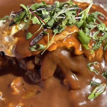 Aura Gardens - WAGYU LOCO MOCO (wagyu beef patty. caramelized onion gravy, 2 eggs over medium, white rice, and micro greens) - Breakfast & Brunch Near Me - Carlsbad, California