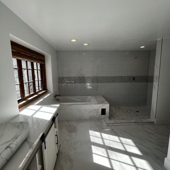 Nailed It Construction - a large bathroom with a tub - General Contractors Near Me Nailed It Construction - a large bathroom with a tub - General Contractors Near Me