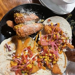 Fried salmon tacos with street corn