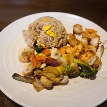 Philip Sushi - a plate of food on a table - Sushi Bars Near Me - Jacksonville, Florida Philip Sushi - a plate of food on a table - Sushi Bars Near Me - Jacksonville, Florida