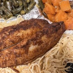 A Taste of New Orleans - Catfish over Alfredo noodles with a side of sweet potatoes and seasoned green beans