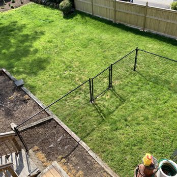 Angel Landscaping - a backyard with a fenced in area - Landscape Architects or Designers Near Me - West Orange, New Jersey