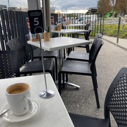 The Coffee Club Takanini Village - Outside chairs at coffee club