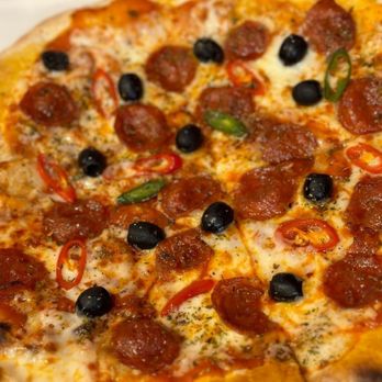 Il Cucciolo Ristorante - Pizza americana - Italian Near Me - Soho, XGL Il Cucciolo Ristorante - Pizza americana - Italian Near Me - Soho, XGL