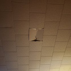 Richards Motel & Supper Club - Not sure how this was damaged, but it was located above one of the beds.