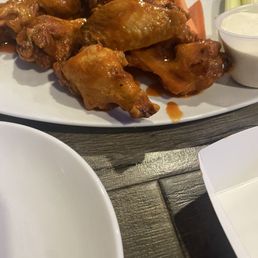Decent wings: mix classic buffalo with lemon pepper, then dip in blue cheese for insane taste