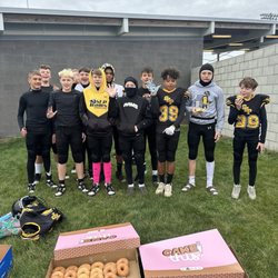 Hy-Vee - Football teams love donuts!!