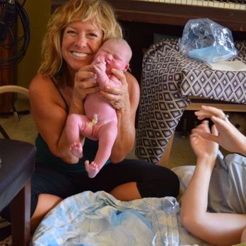 The Midwives Childbirth Services - Napa - Paula holding my newborn princess!! After I gave birth in birthing tub in my living room - Childbirth Education Near Me - Napa, California