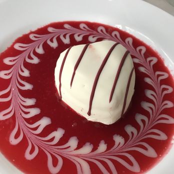 Chef Chai - Ice cream in a raspberry sauce. The outside is a shell of white chocolate. - Asian Fusion Near Me - Honolulu, Hawaii