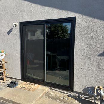 All About Glass & Mirror - Milgard black vinyl sliding glass door. - Windows Installation Near Me All About Glass & Mirror - Milgard black vinyl sliding glass door. - Windows Installation Near Me