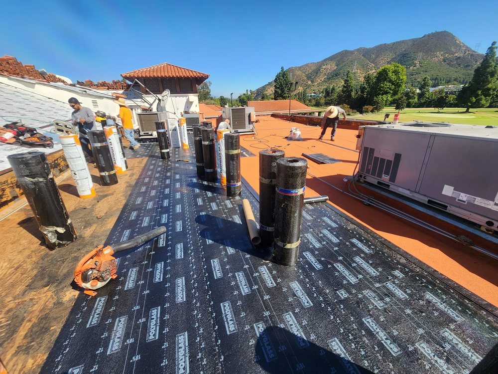 Slide of iHeart Roofing