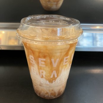 Seven Grams Caffe - Iced Vanilla Latte with Almond Milk - Coffee & Tea Near Me - New York, New York Seven Grams Caffe - Iced Vanilla Latte with Almond Milk - Coffee & Tea Near Me - New York, New York