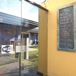 Quedate Muzza - Detalle del pizarrón con las ofertas del día