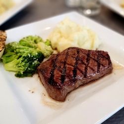 Daly City Cafe - Sirloin steak with red skinned mashed potatoes, broccoli and flame-grilled sourdough bread.