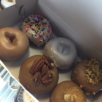 Upper Cup Coffee - Top row: sprinkles, vanilla glaze, maple glaze Bottom row: glazed, maple/pecan, s'more - Donuts Near Me - Columbus, Ohio