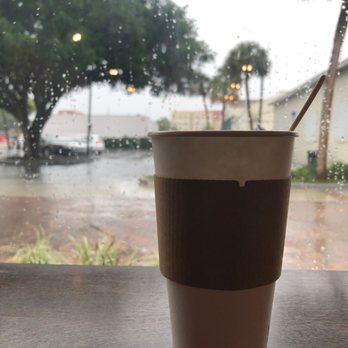 Trilogy Coffee Roasting - 16 oz coffee on a rainy day. - Breakfast & Brunch Near Me - DeLand, Florida Trilogy Coffee Roasting - 16 oz coffee on a rainy day. - Breakfast & Brunch Near Me - DeLand, Florida
