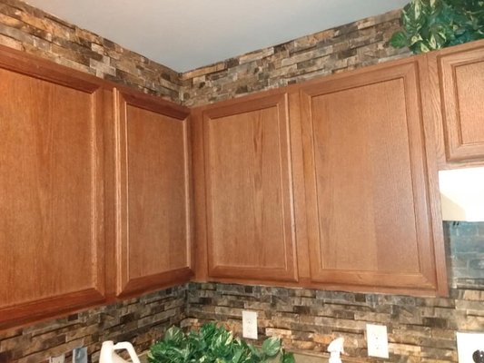 New Kitchen Backsplash - Allow me to transform your ideas into reality! Check out this new kitchen backlash I did for one of my regular clients. We used a 3D waterproof wall paper to make her dream a reality!